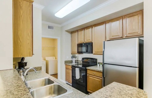 The Colony Apartment | Minutes from Grandscape! Pool, Hot Tub & Gym – Close to The Star & Top Golf!