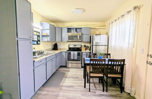 Fairbanks Apartment | Minutes from the Airport. Free WiFi & parking! Onsite laundromat & food market.