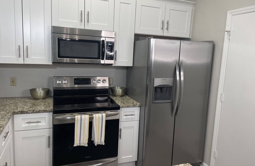 Charlotte House | Minutes from UNCC, this pristine, single-level home is perfect for family fun!
