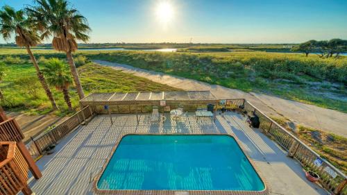Corpus Christi House | Minutes to the Beach Pool Balcony w Nature Views Compass 17 by AvantStay