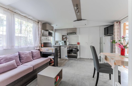 Saint-Julien-en-Born RV Rental | Mobile Home 'Les Dunes De Contis' with Shared Pool, Private Terrace and Air Conditioning