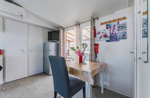 Saint-Julien-en-Born RV Rental | Mobile Home 'Les Dunes De Contis' with Shared Pool, Private Terrace and Air Conditioning