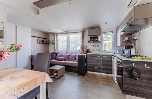 Saint-Julien-en-Born RV Rental | Mobile Home 'Les Dunes De Contis' with Shared Pool, Private Terrace and Air Conditioning