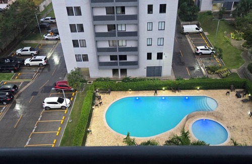 Punal Apartment | Modern 3BR Apartment w/Pool View & Smart Lock — 7 Min from Santiago Airport