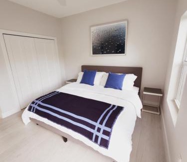 West Bay Apartment | Modern 2 bedroom walking distance to the beach!