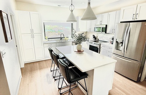 Arnolds Park Condo | Modern 3-Story Condo Across from Arnold’s Park – Walk to Fun, Lake, & Dining!