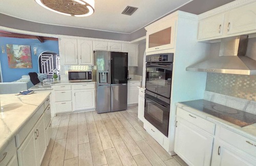Port Saint Lucie House | Modern 3BDR 2B Boho Home with backyard and impact windows safe for hurricane.