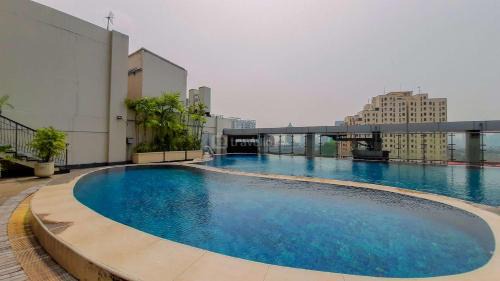 East Jakarta Apartment | Modern and Homey 2BR at MT Haryono Square Apartment By Travelio
