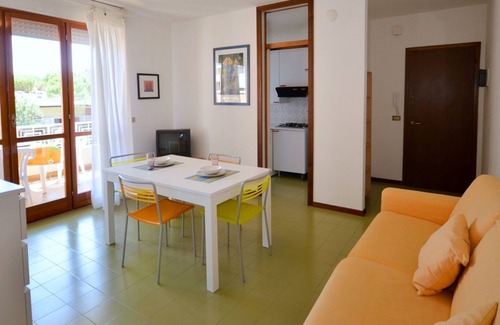 Lignano Riviera Apartment | Modern apartment in a resort-style residence with pool
