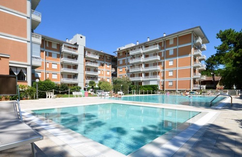 Lignano Riviera Apartment | Modern apartment in a resort-style residence with pool