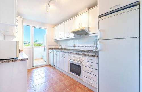 La Cala de Mijas Apartment | Modern Apartment 'In Jardin Botanico' with Sea View, Pool, Wi-Fi, Garden & Terrace