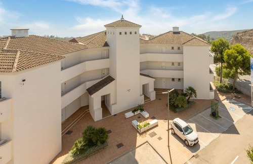 Puerto de la Duquesa House | Modern apartment in Manilva with shared pool and 5 minutes walk of the sea