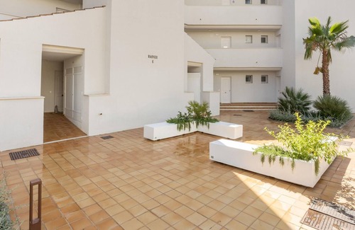 Puerto de la Duquesa House | Modern apartment in Manilva with shared pool and 5 minutes walk of the sea