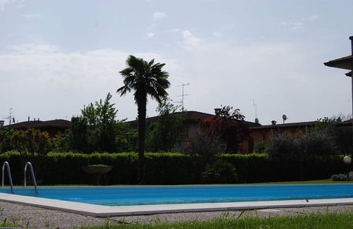 Lugana Apartment | Modern apartment, Residence with swimming pool surrounded by greenery with FREE Wi-Fi