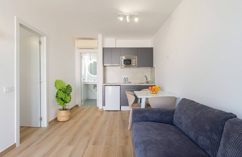 Corralejo Apartment | Modern apartment. Swimming pool and terrace. Right on the beach in Corralejo - Home For Guest