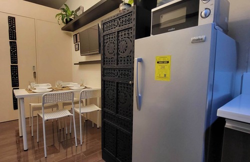 Legazpi Village Condo | Modern Asian themed Condo w/View Near Airport & Sky Way - 1