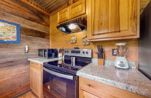 Chalet Village North Cabin | Modern cabin with pools, private hot tub, pool table, & free attraction tickets