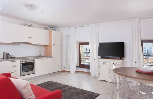 Riva del Garda Apartment | Modern, Centrally Located Apartment "RivApartmentsDowntowN - Love" with a View of the Old Town of Riva del Garda, A/C & Wi-Fi