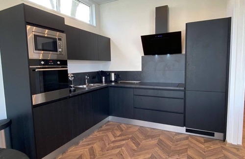 Kaatsheuvel Ski Chalet | Modern chalet with dishwasher, near the Efteling