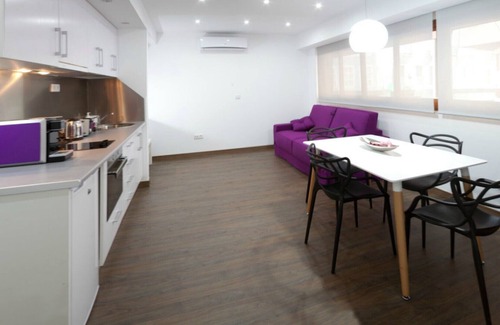 Ensanche Diputacion Apartment | Modern Colored Apartments in the Heart of Alicante