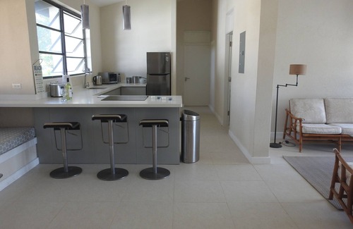Hastings Apartment | Modern condo with seaviews, pool, close to beach, South Coast, good WiFi