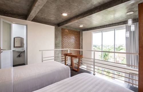 Pererenan Hotel | Modern, Deluxe Room with pool view #2