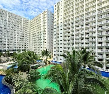 Barangay 76 Apartment | Modern Double-Sized Bed with Netflix & Pool View