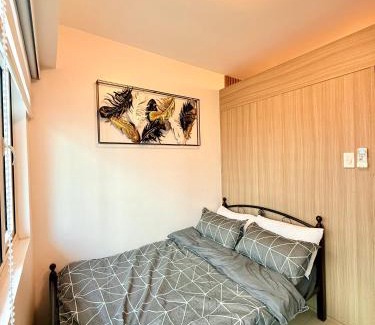 Barangay 76 Apartment | Modern Double-Sized Bed with Netflix & Pool View
