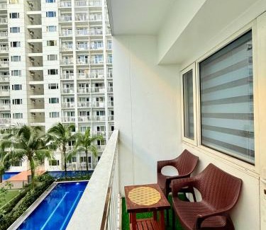 Barangay 76 Apartment | Modern Double-Sized Bed with Netflix & Pool View