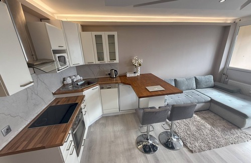 Kaposvar Apartment | Modern Flat w/Home Office, Balcony & Fireplace