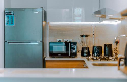 Abu Dhabi Apartment | Modern Glass Suite with City Views Reem Island
