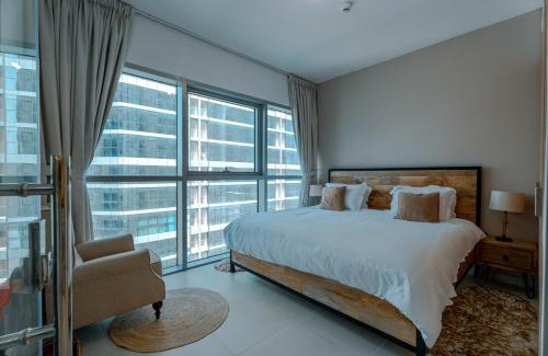 Abu Dhabi Apartment | Modern Glass Suite with City Views Reem Island