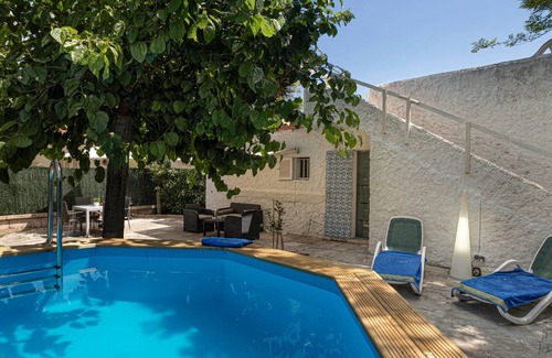 Muro House | Modern Holiday Home “Casa Enriqueta” with Sea View, Garden, Terraces & Pool