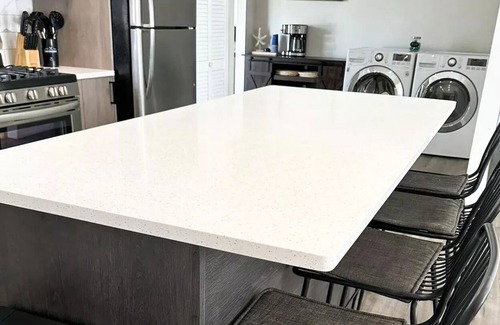 Lincoln House | Modern Home near downtown and UNL with Firepit, BBQ Grill & Air Hockey!