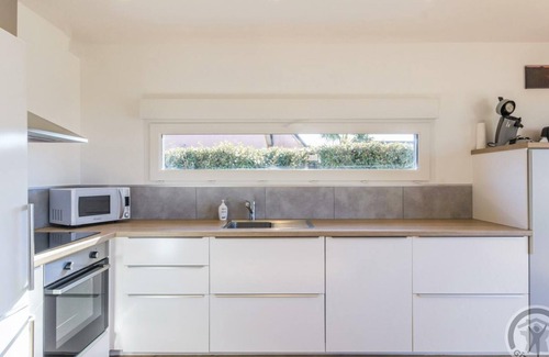 Portbail Cottage | Modern House with Terrace, Bioclimatic Pergola & Enclosed Garden in Portbail