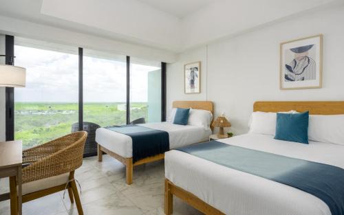 Merida Municipality Apartment | Modern Lakeview Condo with Pool and Gym by LAHOS