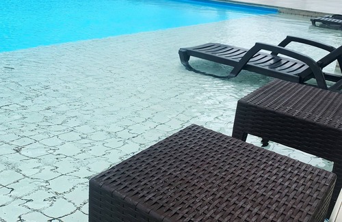 El Cangrejo Apartment | Modern loft-style, 2 level apartment with city views, cover parking and pool.