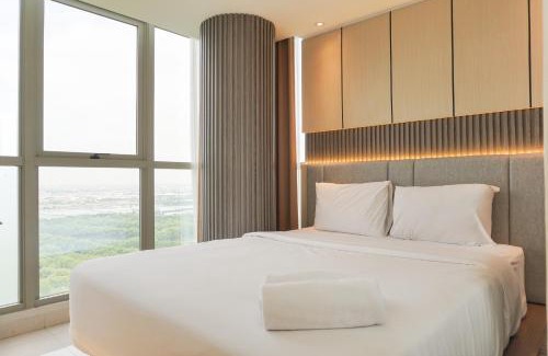 Pantai Indah Kapuk Apartment | Modern Look and Comfy 2BR Gold Coast Apartment By Travelio