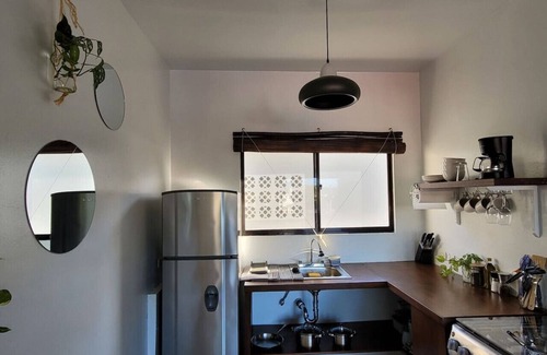 Las Pampas Apartment | Modern Luxury- In town, Peaceful and Quiet with AC and Hot Water
