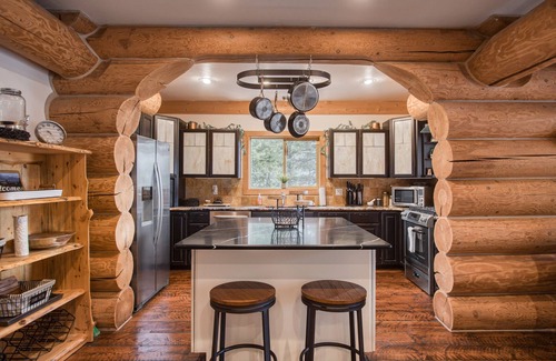 Sagle House | Modern, peaceful log cabin in the woods with incredible lake & mountain views