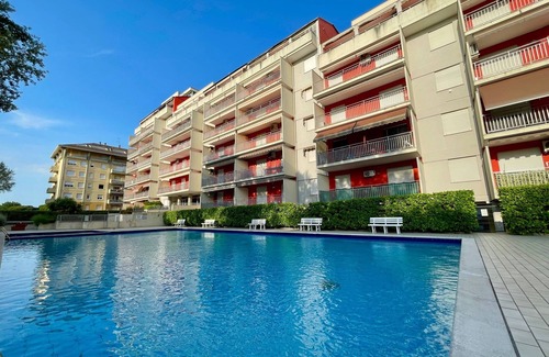 Porto Santa Margherita Apartment | Modern poolside stay with balcony