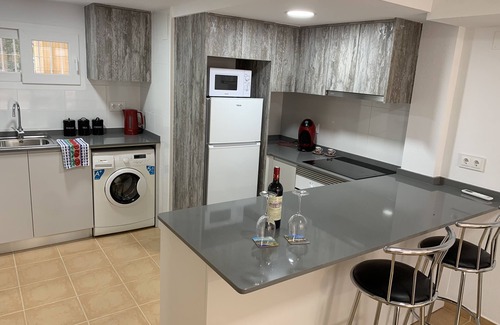 Lomas Apartment | Modern south facing Apartment with Sun Terrace 10 minute walk to sandy beach.