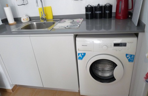 Lomas Apartment | Modern south facing Apartment with Sun Terrace 10 minute walk to sandy beach.