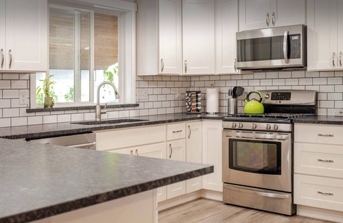 Olympia House | Modern Self check-inLarge Fenced Yard A/C Close to Everything Quiet Neighborhood