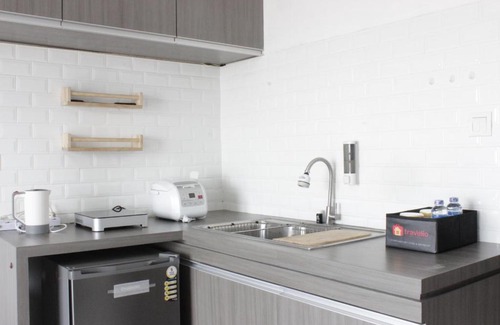 Cibaduyut Apartment | Modern & Spacious 1BR at Mekarwangi Square Apartment By Travelio