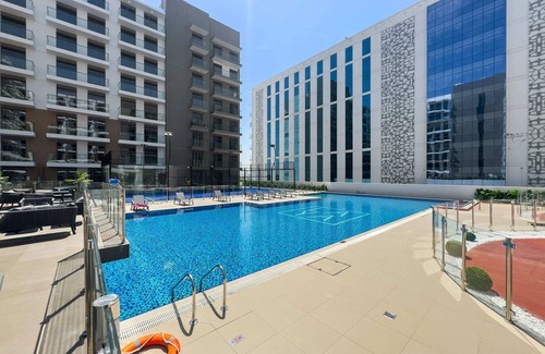 Dubai Apartment | Modern Studio in residence with pool gym and paddl