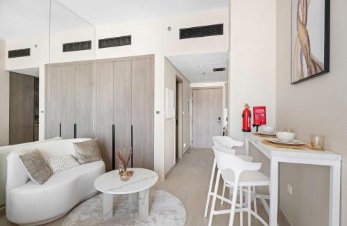 Dubai Apartment | Modern Studio in residence with pool gym and paddl