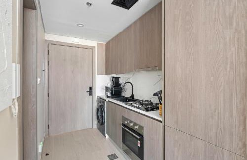 Dubai Apartment | Modern Studio in residence with pool gym and paddl