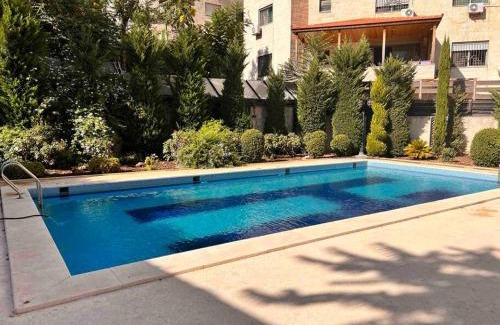 Amman Apartment | Modern Sunny 2 BR apartment, with pool and big yard