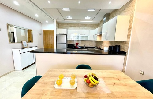 Tangier Apartment | Modern Tangier centre elegance with Seaview - Steps to Beach, train, attractions